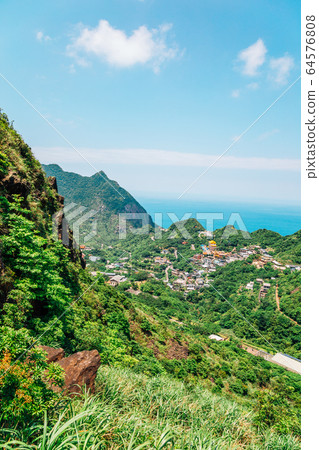 Jinguashi old town and mountain in Taiwan 64576808