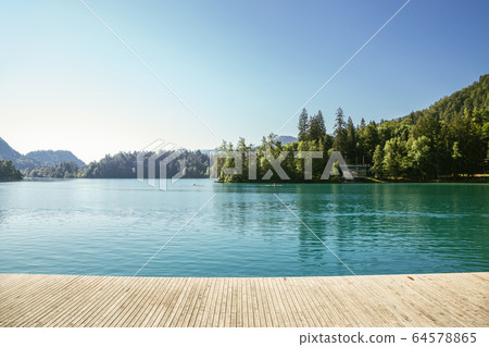 Lake Bled and wooden deck in Slovenia Lake Bled and wooden deck in Slovenia 64578865