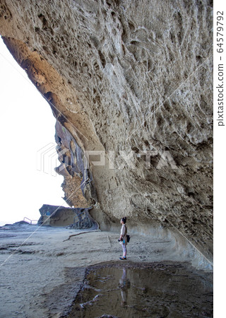 Mie Prefecture Kumano City Onigajo Woman overlooking the sea Mie Prefecture Kumano City Onigajo Woman overlooking the sea 64579792