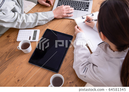 Meeting in work clothes Meeting in work clothes 64581345