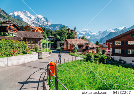 Wengen village and alps nature view in Switzerland 64582267