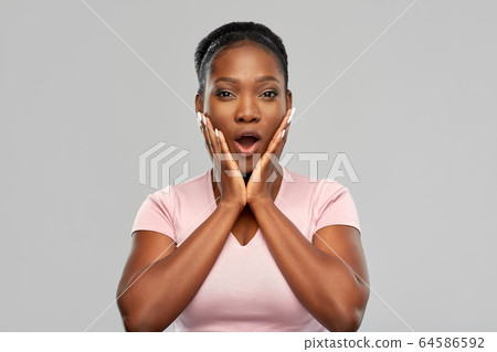 shocked african american woman with open mouth shocked african american woman with open mouth 64586592