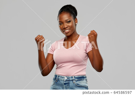 happy african american woman celebrating success happy african american woman celebrating success 64586597