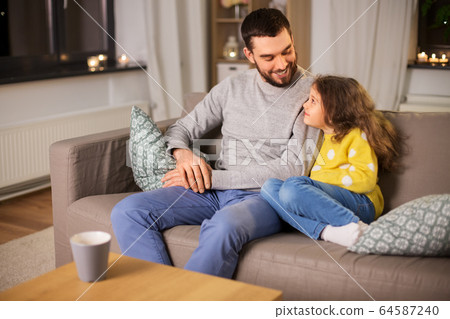 happy father and little daughter at home at night happy father and little daughter at home at night 64587240