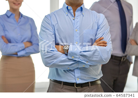 close up of smiling business people at office 64587341
