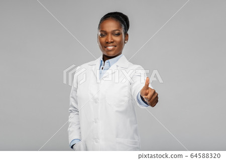 african american female doctor showing thumbs up african american female doctor showing thumbs up 64588320