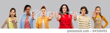 group of different women making stopping gesture group of different women making stopping gesture 64588491