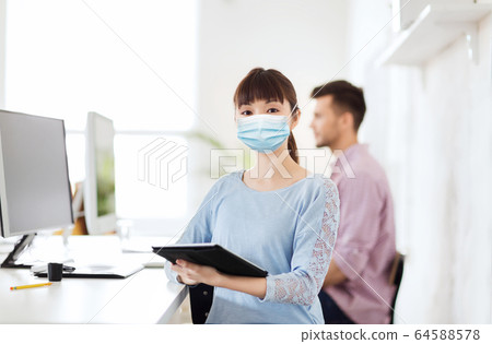 asian woman in protective medical mask at office 64588578