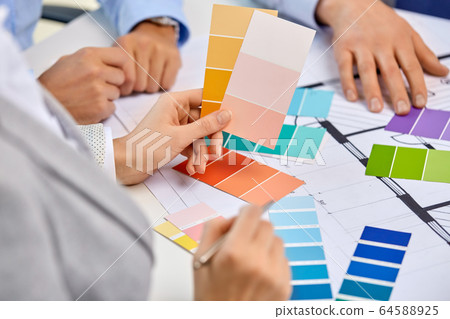 close up of designers team working with blueprint close up of designers team working with blueprint 64588925