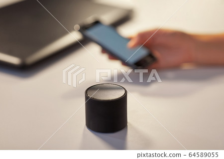 smart speaker on table at office smart speaker on table at office 64589055