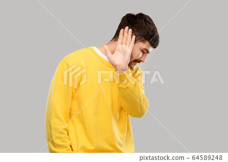 serious young man showing refusal gesture serious young man showing refusal gesture 64589248