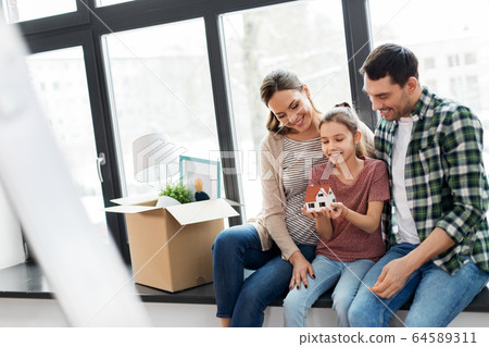 happy family with house model moving to new home happy family with house model moving to new home 64589311