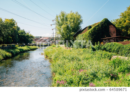 Countryside village landscape in Hunedoara, Romania 64589671