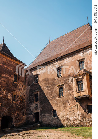 Medieval Corvin Castle (Hunyad Castle) in Hunedoara, Romania 64589672
