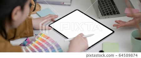 Cropped shot of female designer brainstorming on 64589874