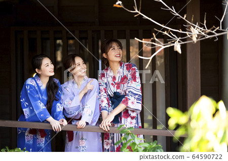 Women and friends enjoying a hot spring trip Women and friends enjoying a hot spring trip 64590722