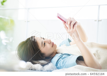 Young lady · Smartphone Young lady · Smartphone 64592184