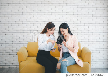 women gossip with happy emotional women gossip with happy emotional 64596670