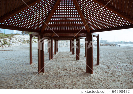 Gazebo. Canopy. on the sea. Beach canopy. 64598422