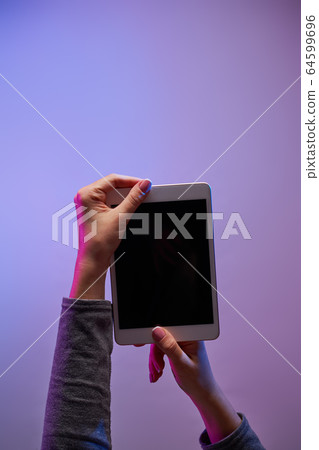 Human's hands with smartphone and blank black screen 64599696