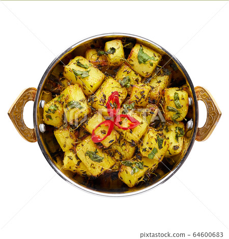 Aloo Methi in copper kadai, bowl isolated at white 64600683