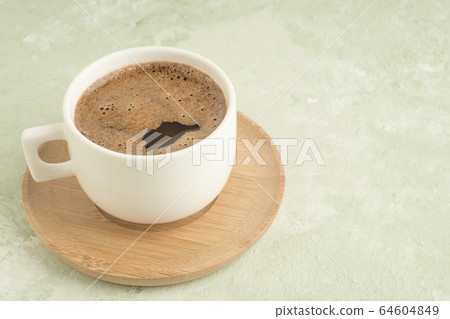 cup of Turkish coffee on a green with copy space 64604849