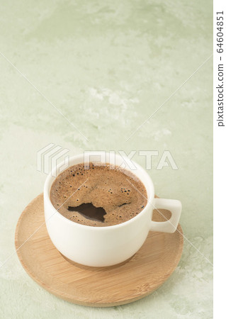 cup of Turkish coffee on a green with copy space cup of Turkish coffee on a green with copy space 64604851