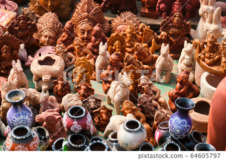 Street market exhibition of handmade pots, ceramic products, souvenirs. Udaipur, Rajasthan, India Street market exhibition of handmade pots, ceramic products, souvenirs. Udaipur, Rajasthan, India 64605797