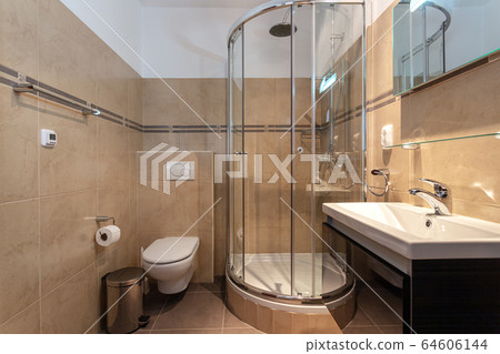 Modern shower room with a booth. European hotel design. Modern shower room with a booth. European hotel design. 64606144