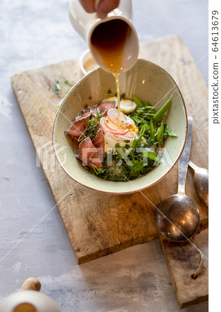 Russian cold soup okroshka on wooden board Russian cold soup okroshka on wooden board 64613679