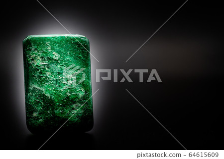 Natural stone Aventurine gemstone black background Natural stone Aventurine gemstone black background 64615609