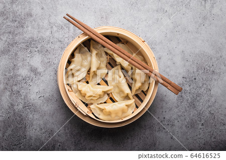 Asian dumplings in bowl Asian dumplings in bowl 64616525