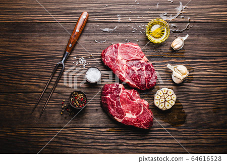 Raw marbled meat steak Ribeye 64616528