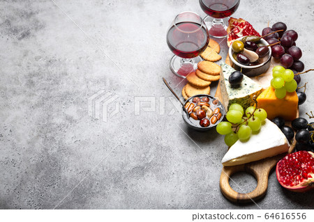 Selection of cheese and appetizers Selection of cheese and appetizers 64616556