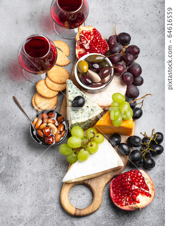Selection of cheese and appetizers Selection of cheese and appetizers 64616559