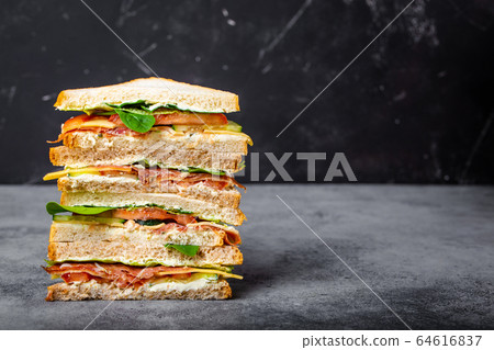 Cut tasty sandwich concept Cut tasty sandwich concept 64616837