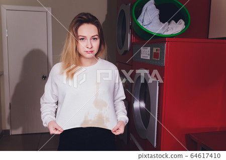 Dirty stain on white shirt in undecided time in daily life, dirt stains concept for create wash content. 64617410