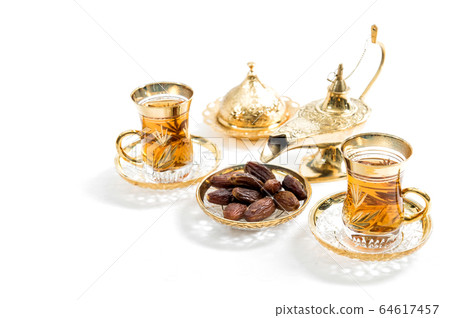 Tea glasses dates white background Oriental Tea glasses dates white background Oriental 64617457