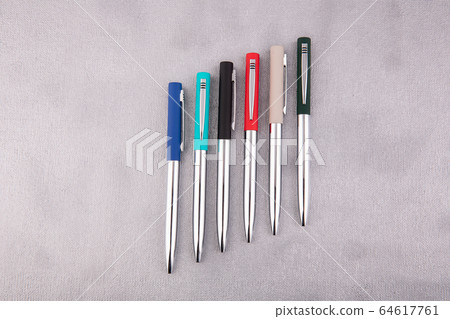 Moscow, Russia - 01/22/2020: Ball and pen handles are multicolored, with different furniture and color range 64617761