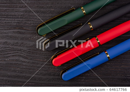 Moscow, Russia - 01/22/2020: Ball and pen handles are multicolored, with different furniture and color range 64617766