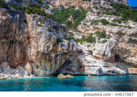 Cala Mariolu beach in Orosei Golf, Sardinia, Italy Cala Mariolu beach in Orosei Golf, Sardinia, Italy 64617867