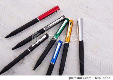 Moscow, Russia - 01/22/2020: Ball and pen handles are multicolored, with different furniture and color range Moscow, Russia - 01/22/2020: Ball and pen handles are multicolored, with different furniture and color range 64618353