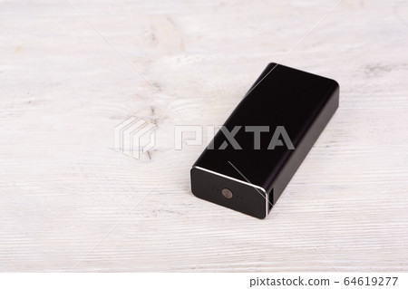 Moscow, Russia - 01/22/2020: Charging device for gadgets, phones and tablets Moscow, Russia - 01/22/2020: Charging device for gadgets, phones and tablets 64619277