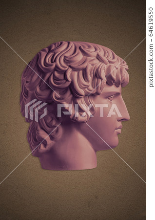 Poster with gypsum copy of ancient famous statue Antinous head on dark textured background. Plaster antique sculpture young man face Renaissance epoch. Poster with gypsum copy of ancient famous statue Antinous head on dark textured background. Plaster antique sculpture young man face Renaissance epoch. 64619550