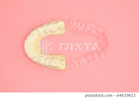 Dental plaster mold and orthodontic silicone trainer. Mobile orthodontic appliance for dental Dental plaster mold and orthodontic silicone trainer. Mobile orthodontic appliance for dental 64619612