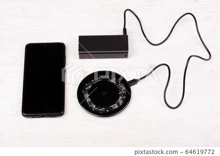 Moscow, Russia - 01/22/2020: Charging device for gadgets, phones and tablets 64619772