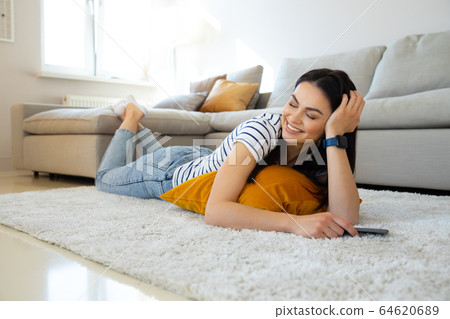 Beautiful gorgeous lady feeling happiness and calmness 64620689