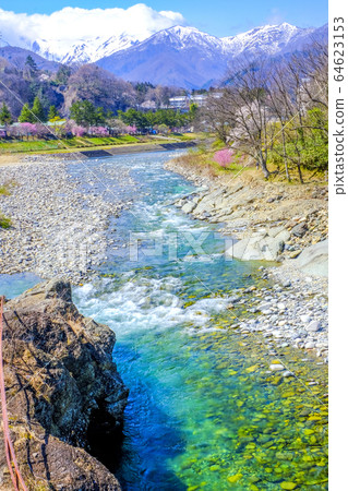 Spring Tone river and snow mountain (vertical) Spring Tone river and snow mountain (vertical) 64623153