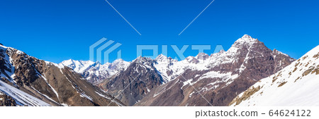 ski in chile on a sunny day with lots of snow. ski in chile on a sunny day with lots of snow. 64624122