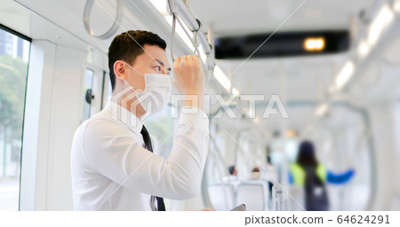 man with mask in metro man with mask in metro 64624291